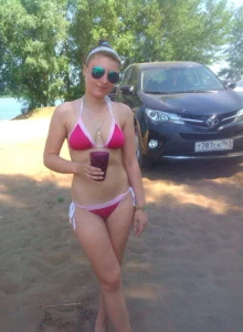 Teen blonde gf in green bikini outside